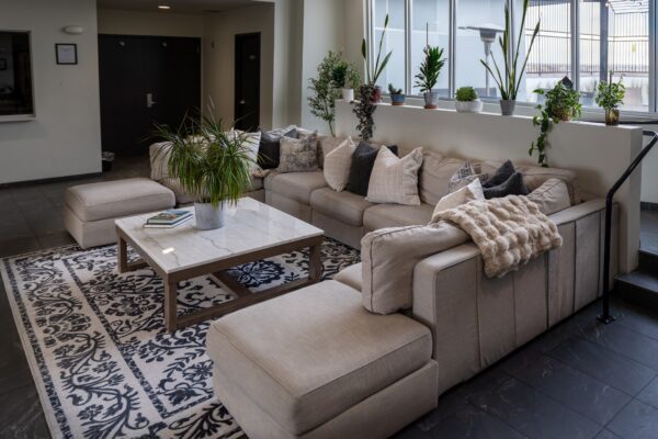 An angled view of the co-ed common area’s sectional couch